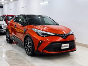 Front view of an orange Toyota C-HR, Second Hand Car For Sale in Tejgaon