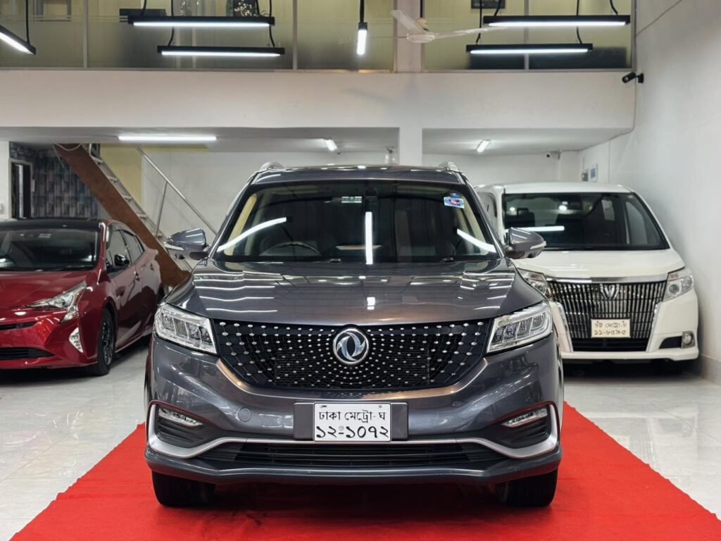 Grey DFSK SUV displayed at Luthfor Rahman Car Showroom